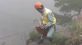 Abseiling cleaners pick up half a tonne of rubbish from China's famed Yellow Mountain