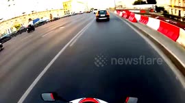 Motorcycle accident. HONDA CBR 600. Barrier fence in the middle of the road.