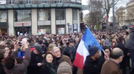 Charlie Hebdo protest marchers gather around Marianne statue on Place de la Republique