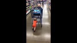 Strong baby pushing shopping cart