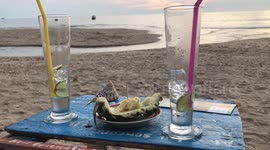 Cocktails on the beach at sunset in Koh Lanta, Thailand