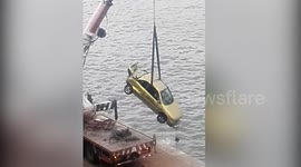 Sunk Car Emerges from Sea