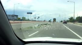 Trash Spilled From Truck On Highway 50