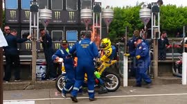Rider and mechanic engulfed in flames at TT motorcycle race