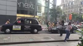 Woman Distracted By Naked Bike Ride