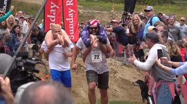 Hilarious falls, trips and close calls at the North American Wife Carrying Championship
