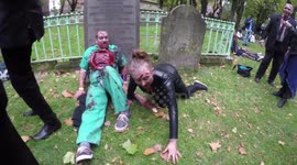 Zombies walk through the streets of London for charity