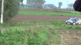 rally car goes off the road , Renault Clio Rally Car