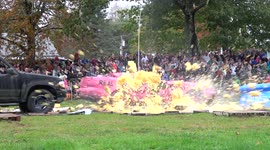 Americans drop massive pumpkins from crane onto cars