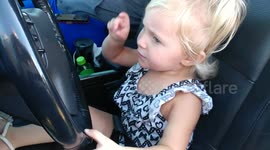Cutest Girl singing Wheels on the bus.