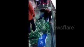 Tourist terrified by new glass walkway that cracks under weight