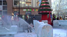 Cutting ice for Harbin's snow and ice festival in China