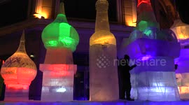Ice sculpting at night in Harbin, China