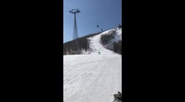 North Koreans carving the piste