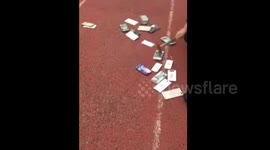 Teacher at Chinese school smashes students' mobile phones