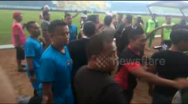 Football player kick the referee for being given a red card