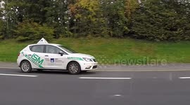 151D10108 ISM Irsh School Of Motoring driving school instructor on his mobile
