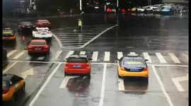 Driver throws umbrella to very wet on-duty policeman