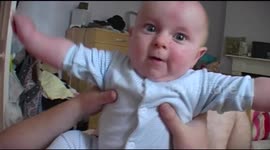 Baby tries to eat camera