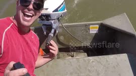 Huge carp jumps into boat on Missouri River