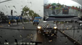 BMW runs red light and over takes a car the stops for the red light but gets karma from a bus driver who holds him out in the opposite lane
