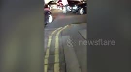 A pair of drivers were caught on camera battering each other