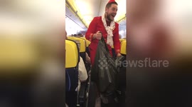 Stag forced to dress up like air hostess on flight and collects rubbish