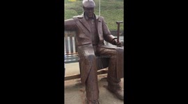 Ruby the Collie dog barks at Freddie Gilroy statue in Scarborough