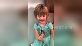 Three-year-old confuses peace sign with rude gesture