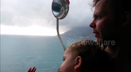 Dad and Toddler Ride Bus Along Amalfi Coast