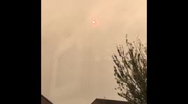 Red burning Sun over Cardiff Wales