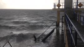 This diehard is out for a 5km swim during Storm Ophelia