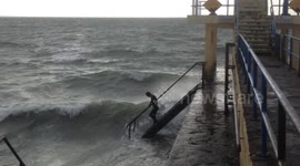 Thrillseekers leap into Ophelia's raging seas