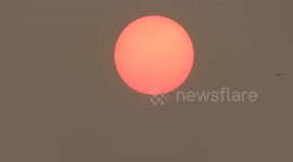 Red sun phenomenon above Watford, England