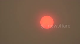 Bright Orange sun from Sahara dust