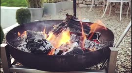 Slow motion fire pit