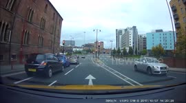 caught on dash cam,car going wrong way down a 3 lane road