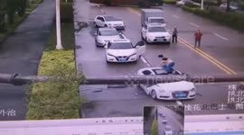 Driver luckily survives after his car gets crushed by a crane jib