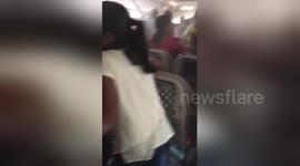 Newsflare Edit - Passengers evacuation of emirates 521