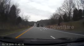 Flying metal sheet breaks car windscreen on Kentucky highway
