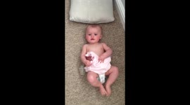 Baby Laughing playing peekaboo