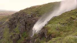Waterfall blown upwards by strong winds of Storm Ophelia