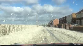 Newsflare Edit - British seafront covered in sea foam after Storm Ophelia