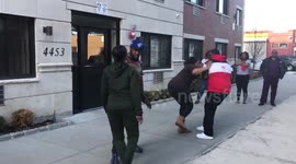 Two women brawl on New York street as male partners look on