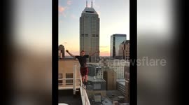 Newsflare Edit - Balancing on a skinny beam at deathly heights