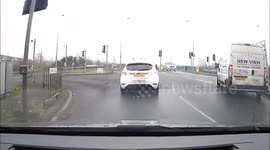 impatient driver trying to beat the learner and fails