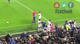 Everton fan tried to hit Lyon goalkeeper while holding his son