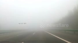 Expressway shut as thick smog chokes Beijing