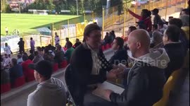 Deaf-blind man enjoys soccer match with help of interpreter