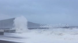 Roads closed as Storm Brian waves batter Aberystwyth, UK